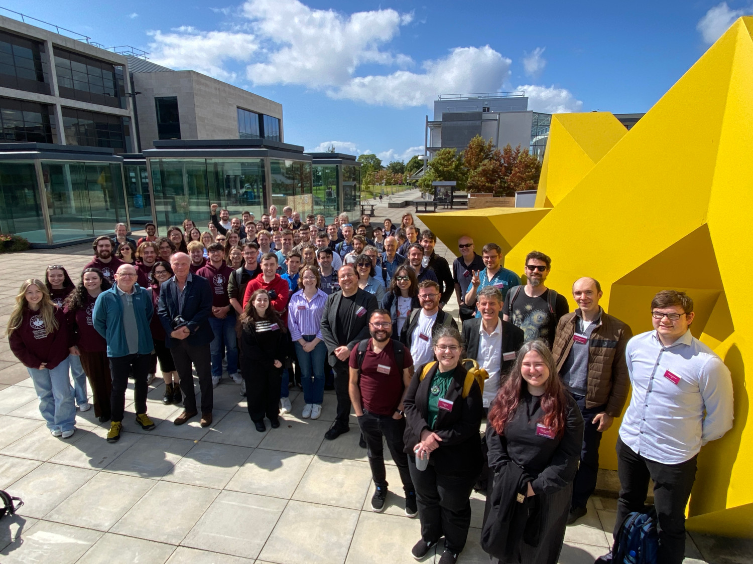 INAM2024 Group picture of attendees at INAM 2024 on the campus of University of Galway. There are approximately 80 people in the photo.